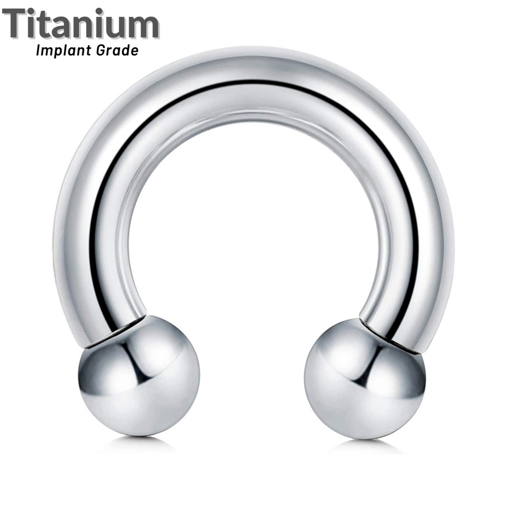 Titanium on sale horseshoe ring